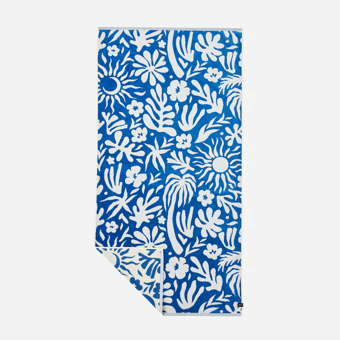 Blue towel with white floral and leaf pattern on a white background