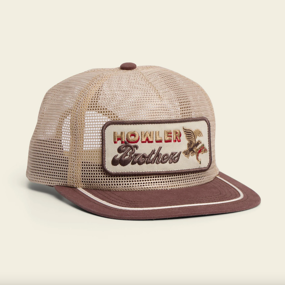 Trucker hat with 'Howler Brothers' logo on a beige background