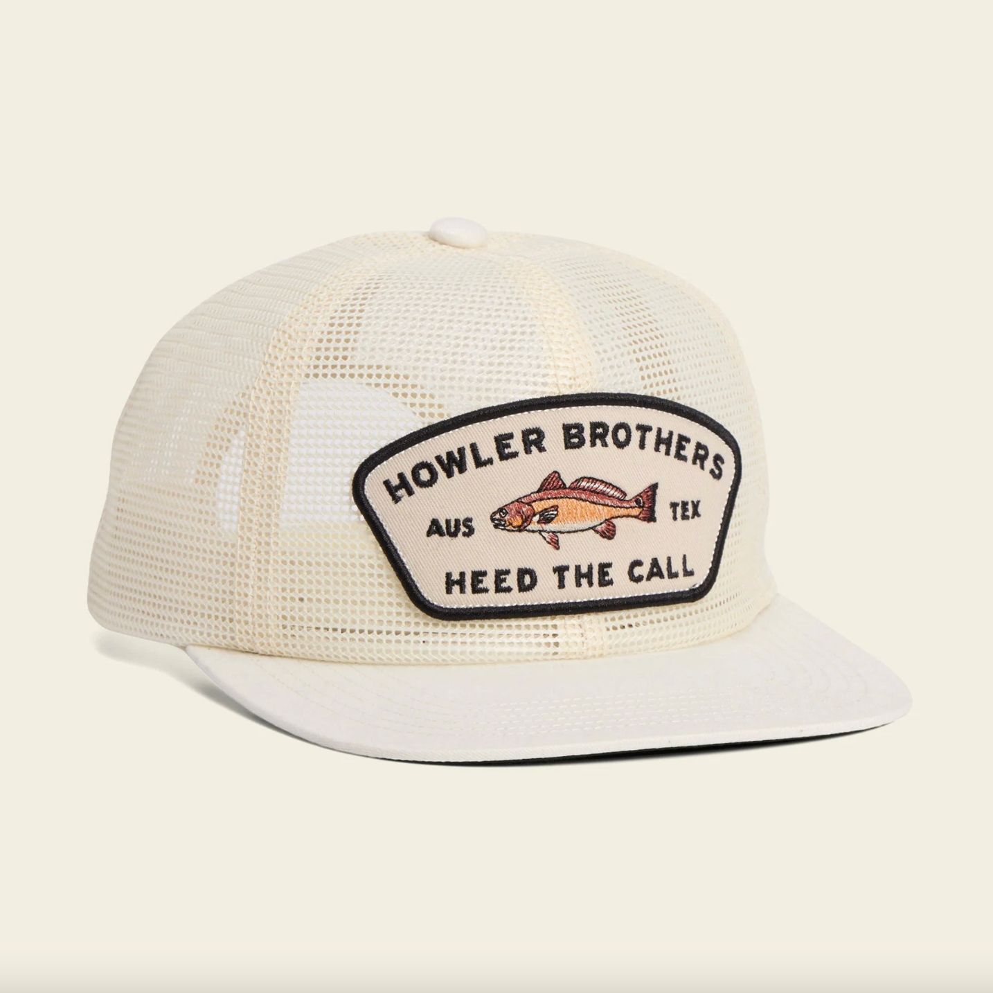 White mesh cap with Howler Brothers logo on a beige background