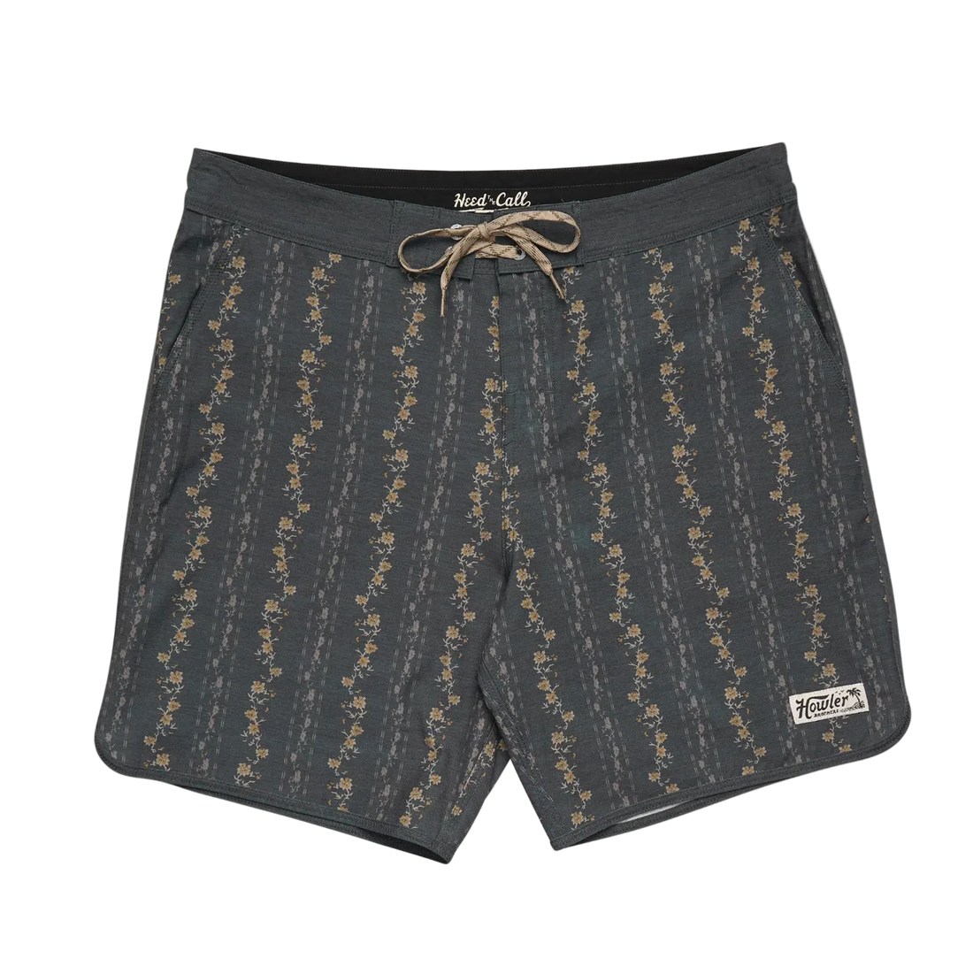 Dark gray shorts with a subtle pattern on a beige background